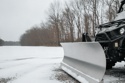 The 8 Best ATV and UTV Snow Plows (2026): best atv snow plow in an autumn garden setting