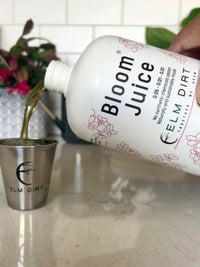 Pouring Bloom Juice concentrate into a measuring cup