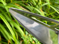 Sharpened side edge and flow-through window on the stainless steel Spear Head Hoe blade
